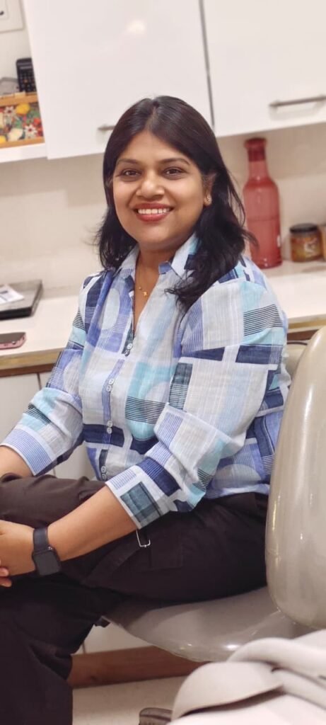 Dr. Rinku Mittal treating a dental patient